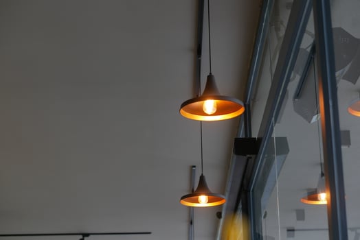 Elegant and Stylish Pendant Lights Beautifully Hanging from a Modern Ceiling photo