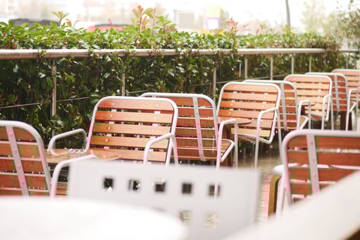 Comfortable and Cozy Outdoor Seating Area Featuring Wooden Chairs for Relaxation photo