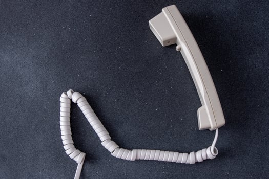 Telephone handset with cord. Old Phone photo