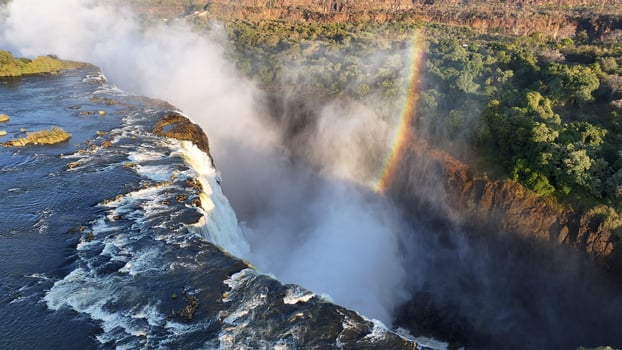 Stunning Water Fall Rainbow in Victoria Falls Matabeleland North Zimbabwe . Nature African. photo