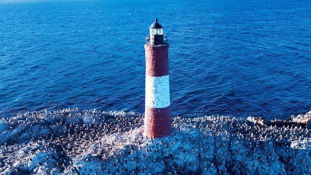 Above view of Ushuaia Lighthouse in Ushuaia Tierra del Fuego Argentina . Bay Aerials. photo