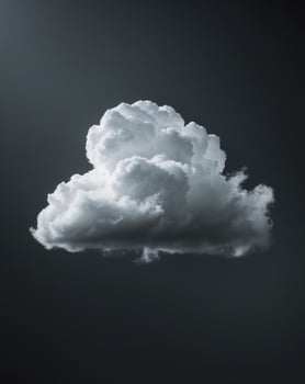 Single white cloud floating on a dark black background photo