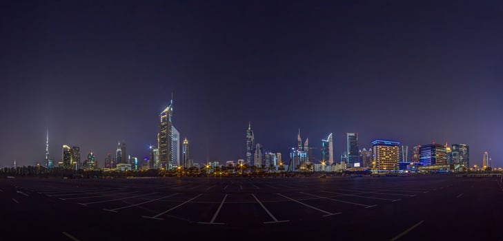 Dubai skyline panorama at night with illuminated skyscrapers in 2015 photo
