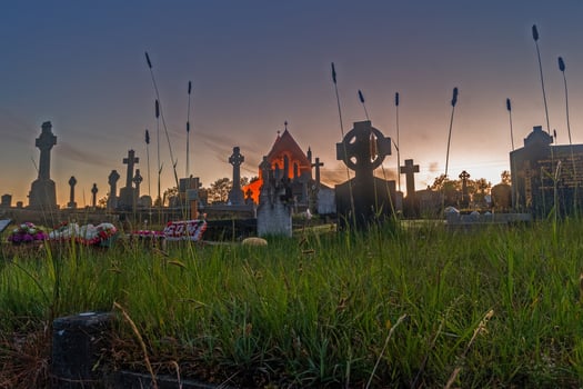 Old Scottish cemetery with historic church at dusk 1 photo