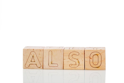 Wooden cubes with letters also on a white background photo