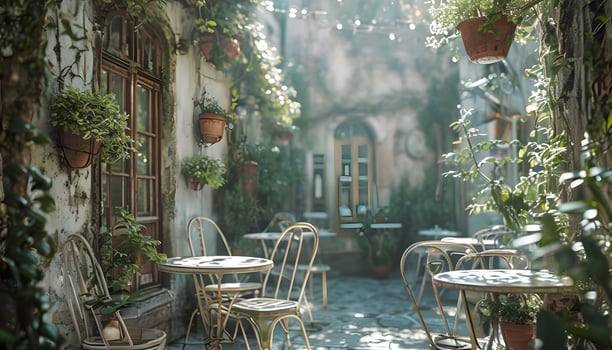 A courtyard with tables and chairs in the middle of a city photo