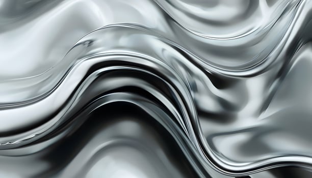 A silver metal wave pattern with a black background photo