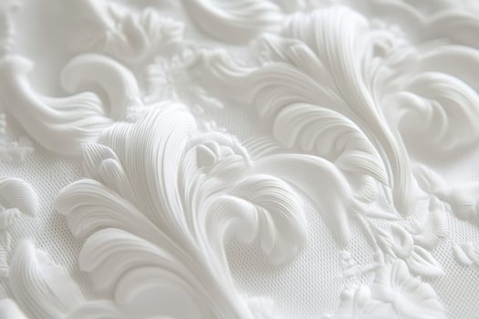 Elegant white textured fabric with intricate floral patterns and designs photo