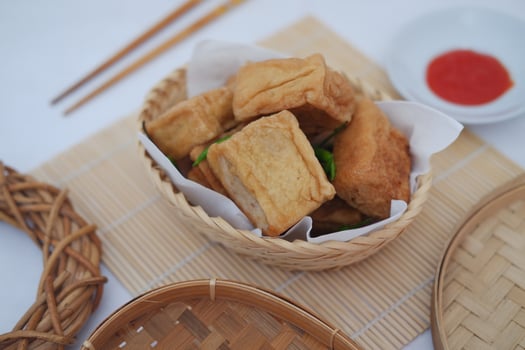 Indonesian traditional snack made from tofu and beef. Served in rattan basket. photo