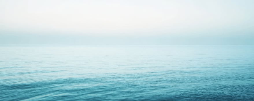 Calm ocean horizon with gentle waves under clear sky photo