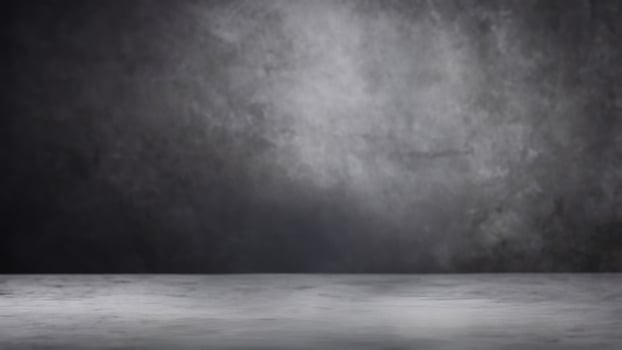 Dark, moody background perfect for showcasing products. Subtle lighting and textured surface create a dramatic backdrop for your photos. photo