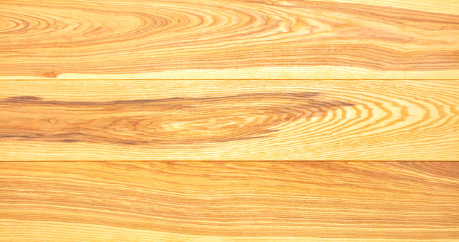 The texture of pine boards with a pronounced pattern of wood fibers. photo