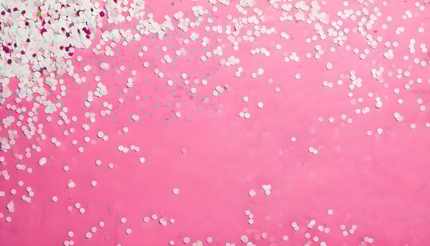 A pink background with confetti and confetti photo