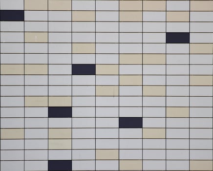 Tiled metalplastic sheet texture with different colors. photo