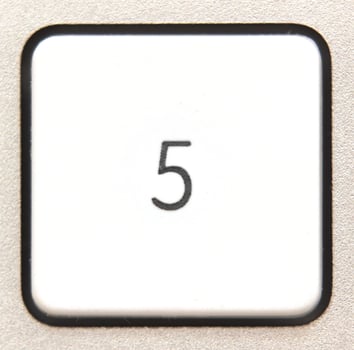 Button 5 from a modern numpad. photo