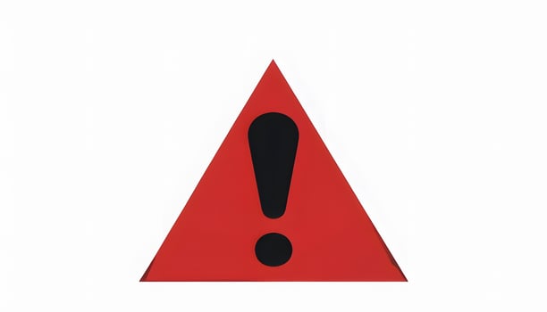 A red triangle with an exclamation mark on it photo