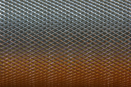 Metallic background with orange and white reflection. photo