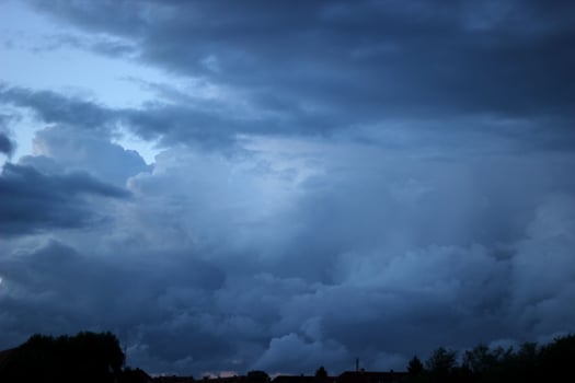 Heavy and dark clouds inevening photo