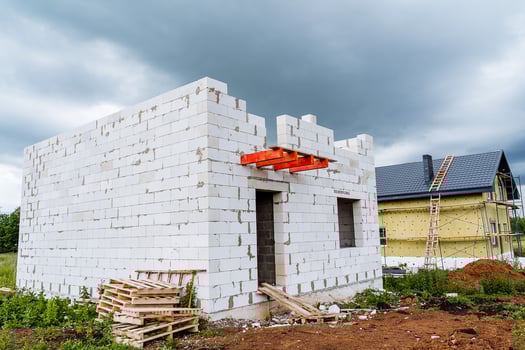 A house under construction with a ladder and a ladder photo