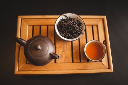 Chinese tea and a cup of black tea photo