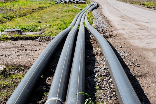 Industrial pipes are essential for construction sites, providing utility installation for infrastructure and development projects. They ensure safety and progress in civil engineering tasks photo