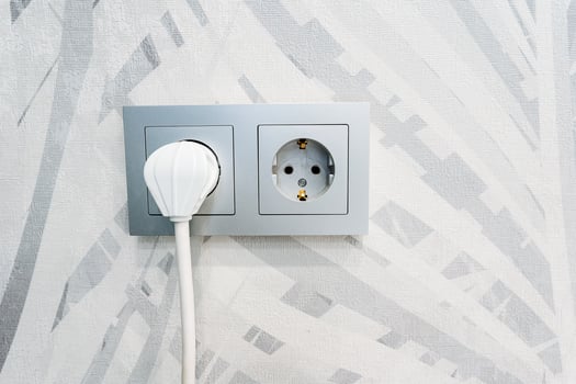 A wall with a white and gray pattern photo