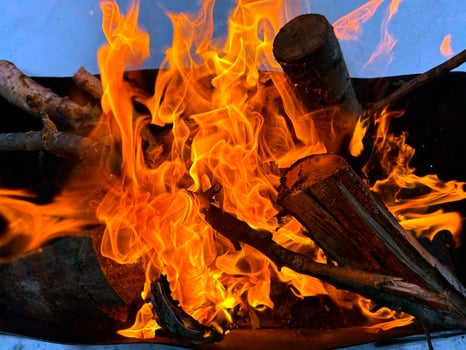 A burning fire in a brazier photo