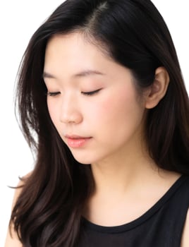 A woman with long black hair and a black top photo