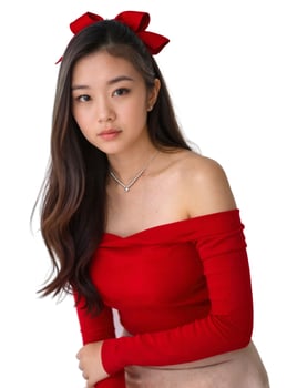 A young woman in a red top and skirt photo