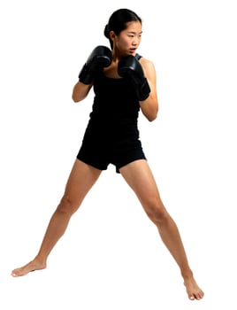 A woman in black boxing gear is posing photo