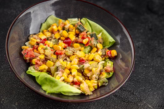 Corn salad vegetables tasty food dish delicious gourmet food background on the table rustic food top view copy space keto and paleo diet Vegetarian and vegan food photo