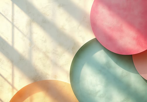 Pastel colored circles on textured background with window light beams photo