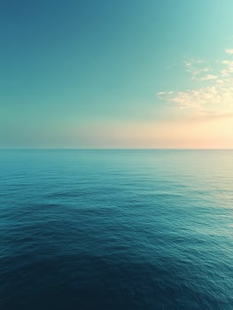 Calm ocean reflecting during twilight photo