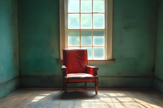 Vintage Interior with Sunlit Red Armchair in Serene Room Setting photo