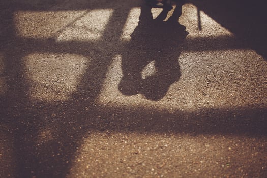 Shadow of a person on the ground photo