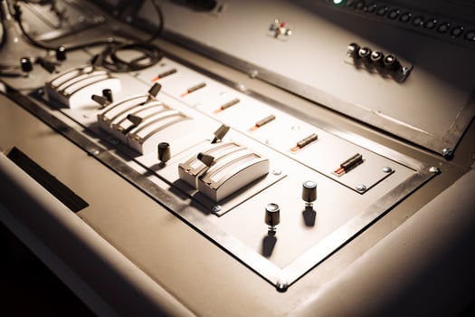 A close up of a control panel with a light on it photo