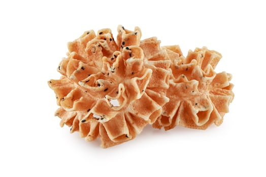 Thai Honeycomb Cookies isolated on the white background with clipping path, Crispy Lotus Blossom Cookie, Thai Dessert . photo
