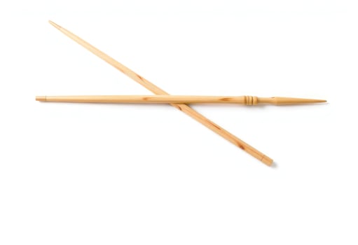 two wooden knitting needles on a white background photo