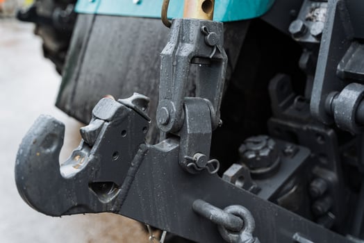 Close up of a tractor with a chain attached photo