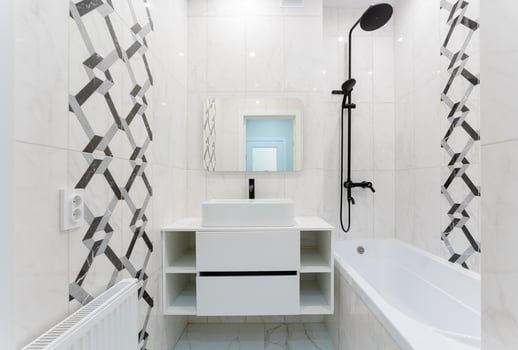 A Modern Minimalist Bathroom featuring Elegant Fixtures and a Stylish Overall Design that maximizes space photo