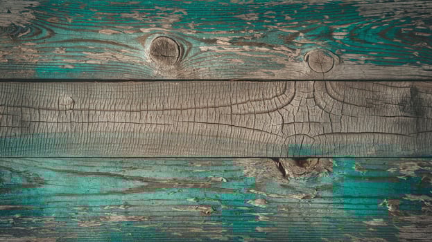 Closeup of Weathered Rustic Wooden Planks with Teal Paint and Natural Textured Wood Grain photo