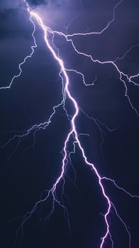 Bright Purple Lightning Bolt Striking Against Dark Stormy Night Sky With Dramatic Clouds photo