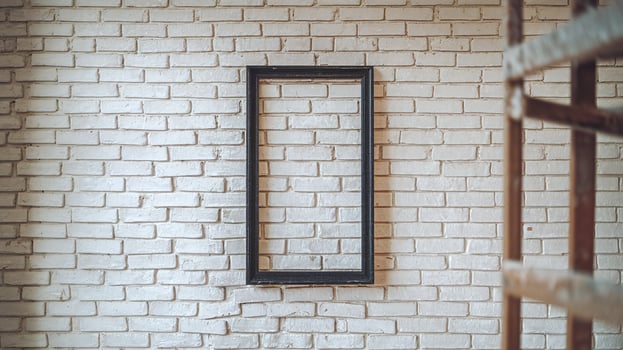 Empty Black Rectangular Frame Hanging On White Textured Brick Wall Rustic Interior Design Concept photo