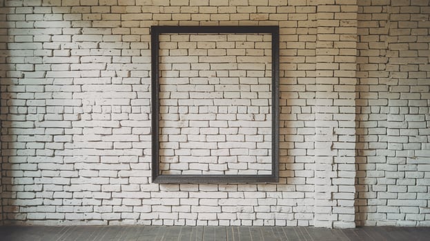 Empty Wooden Frame on White Brick Wall in Minimalist Interior with Natural Light and Wooden Floor photo