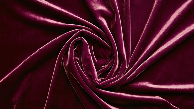 Elegant Deep Burgundy Velvet Fabric Texture with Swirling Pattern and Rich Soft Material Background photo