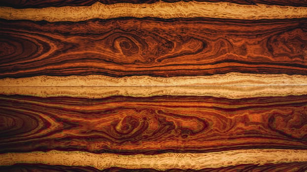 Closeup of Vibrant Natural Dark Brown Wooden Grain Texture with Unique Patterns and Yellow Highlights photo