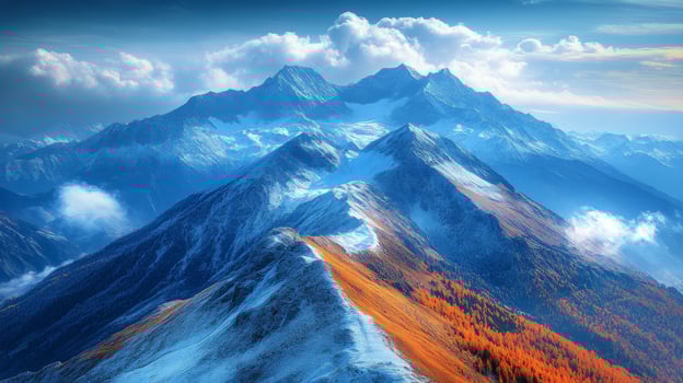 A mountain range with snow covered peaks photo