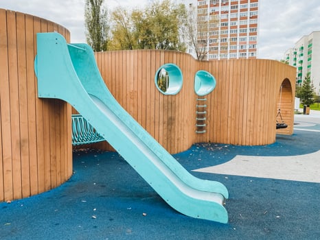 This beautifully crafted wooden playground features a fun slide and sturdy stairs for children, ensuring an enjoyable outdoor experience that inspires creativity and joy photo