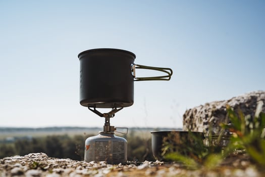 Discover the versatility of a Portable Camping Stove designed specifically for outdoor cooking adventures in the beautiful nature photo