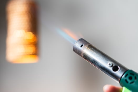 Close-up of a Torch Lighter with Flame photo